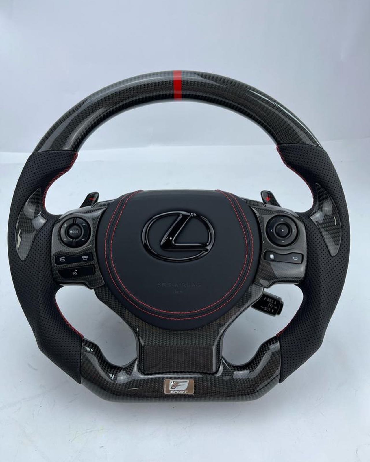Lexus black carbon fiber red stitching steering wheel detail
