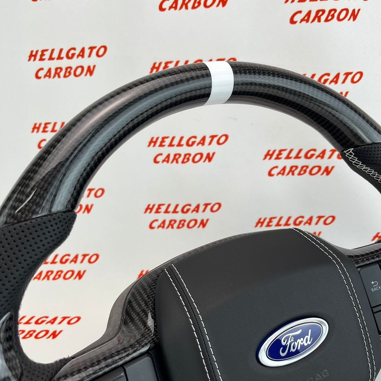 2021+ Ford F-150 Custom Gloss Black Carbon Fiber Steering Wheel | Genuine OEM Flat Bottom | White Stitching | Custom Logo - Image 4