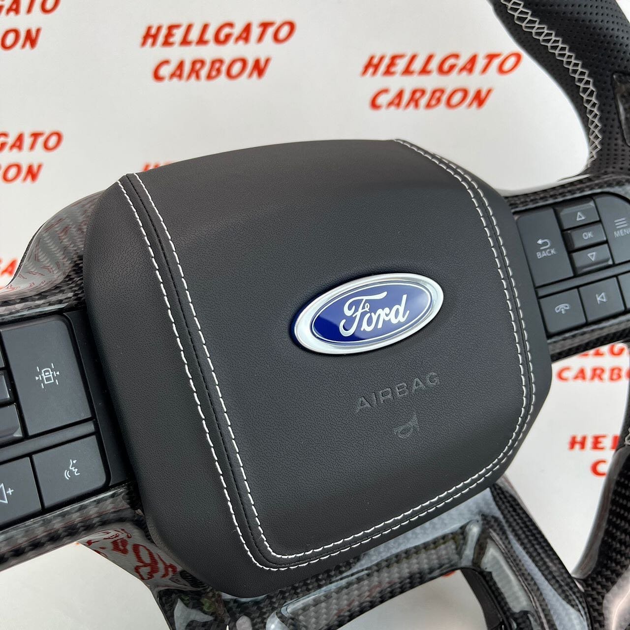2021+ Ford F-150 Custom Gloss Black Carbon Fiber Steering Wheel | Genuine OEM Flat Bottom | White Stitching | Custom Logo - Image 5